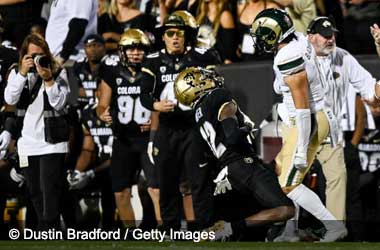 Travis Hunter hit by Henry Blackburn during the 'Rocky Mountain Showdown 2023'